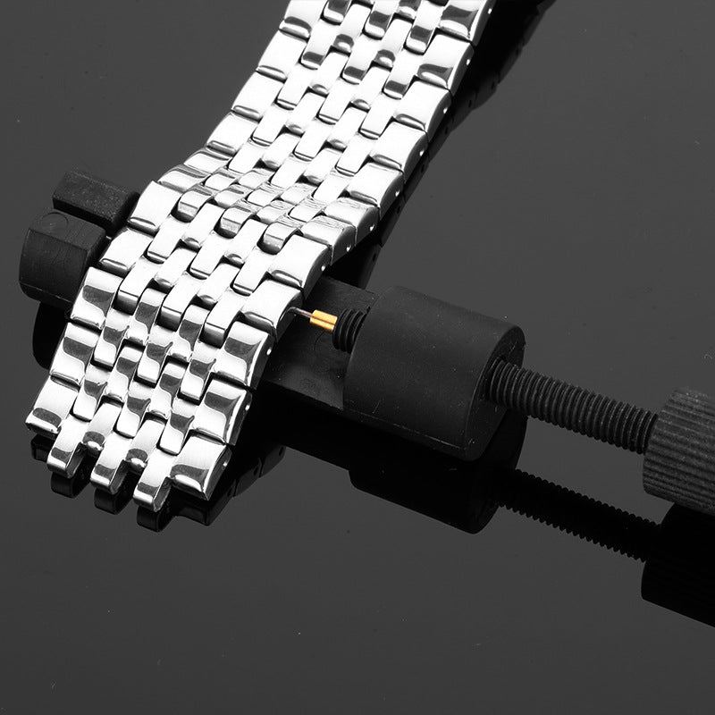 Watch Link Removal Tool in use for adjusting metal watch bands with precision and safety.